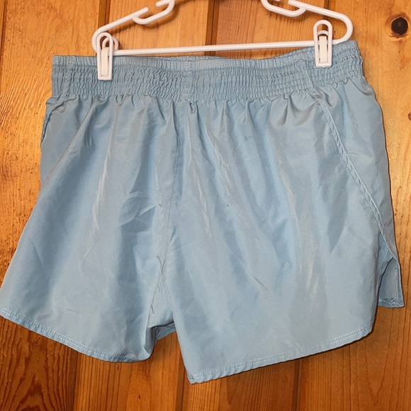 Nike Running Dri-FIT Swoosh mid-rise brief-lined shorts in pale blue size medium - Picture 9 of 11
